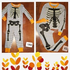 Pajamas brand "Sno⏰zer Button" sizes 18 months and XS. Both are new!